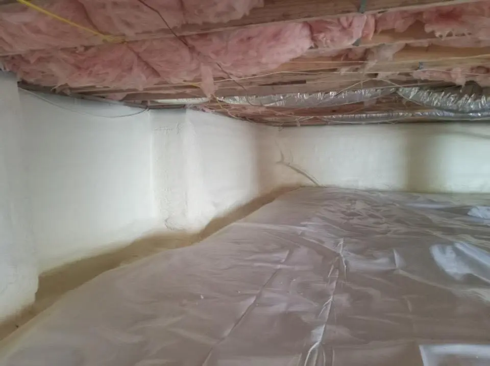 Crawl space encapsulation with closed-cell spray foam for Commercial Roof Restoration in Woodruff